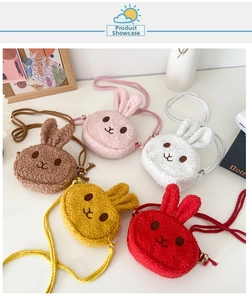 Flat lay of colorful plush bunny crossbody bags in brown, pink, white, yellow and red