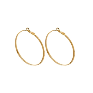 Minimalist gold plated large hoop earrings with textured matte finish on white background