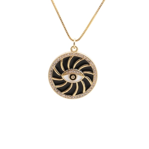 Golden celestial star pendant necklace with evil eye design on polished box chain