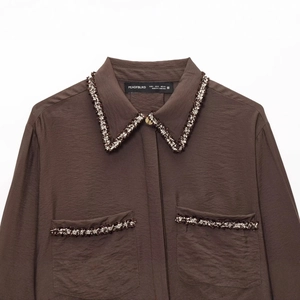 Women's dark brown long sleeve lapel shirt with contrast woven trim and chest pockets