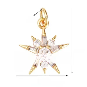 Macro shot of 19x13mm gold-plated brass star pendant featuring clear cubic zirconia stones