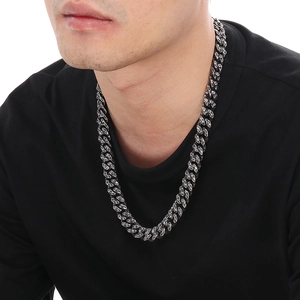 Close-up of vintage hammered cuban link chain necklace in silver finish for men