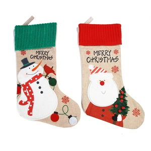 Christmas stocking set with Santa and snowman patterns in linen and knit fabrics