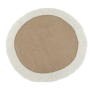 Detail of round jute placemat with white cotton fringe trim on a clean white background