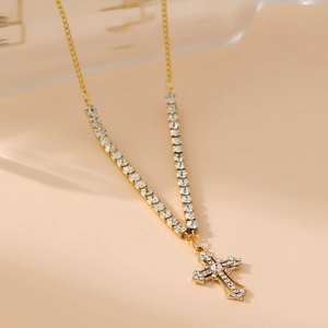 Elegant gold stainless steel cross necklace with shimmering white zircon stones