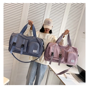 Detailed comparison of blue and purple travel bags with multi-functional pockets and straps