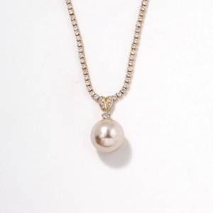 Elegant tennis chain necklace with a champagne pearl pendant and sparkling pavé diamonds