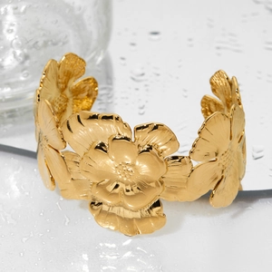 Modern gold floral open cuff bracelet in polished stainless steel with petal designs