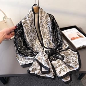 Retro paisley print faux silk scarf shawl in elegant black and gold satin fabric