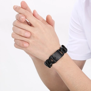 Mens vintage matte black stainless steel Cuban chain bracelet on male wrist