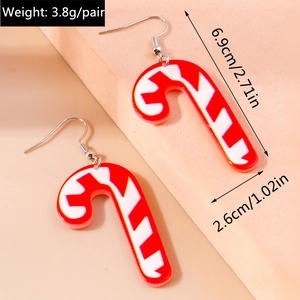Detail view of red and white candy cane earrings with size and weight measurements