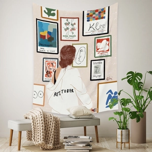 Artistic tapestry showing a woman admiring gallery wall art in a modern home interior