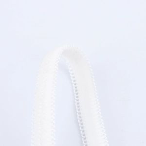 Detail shot of clear white silicone shoulder strap with small loop buckles and lace edges