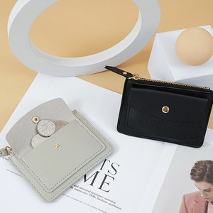 Minimalist multi-functional coin purse and card holder in black and light grey faux leather
