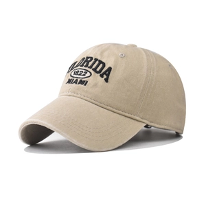 Close-up of Florida 1822 embroidery on khaki washed cotton vintage baseball cap