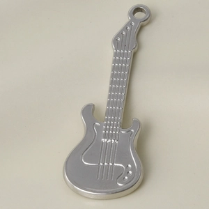 Detailed close-up of a silver stainless steel guitar pendant with realistic embossed strings