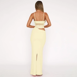 Rear view of yellow mesh slim maxi dress featuring back slit and thin shoulder straps