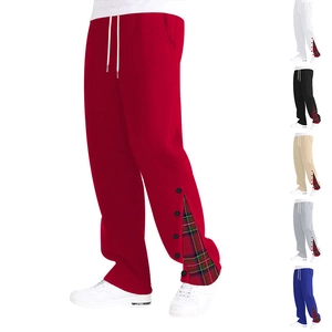 Détail de la taille à cordon et du patchwork à carreaux avec boutons sur pantalon homme
