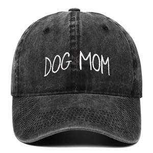 Close-up of DOG MOM white embroidery on charcoal grey washed denim baseball cap detail