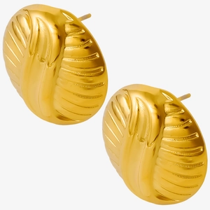 Macro shot of 304 stainless steel golden earrings with detailed striped texture