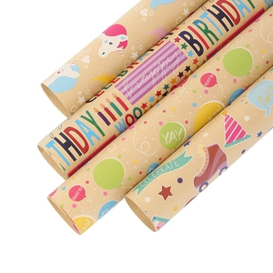 Colorful birthday kraft wrapping paper rolls with unicorn and balloon festive patterns