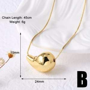 Macro detail of gold plated water drop pendant with 45cm box chain and 24mm size specs