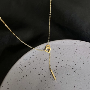 Minimalist 18k gold plated stainless steel necklace with geometric interlocking squares