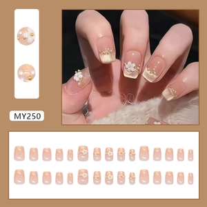 Pink cat eye press-on nails set with pearl flowers and 3D metallic accents