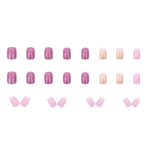 Short round press-on nails set in taro purple and nude pink with a high-gloss glazed finish