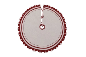 Dettaglio della gonna per albero di Natale in maglia con bordo rosso e lacci
