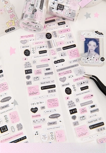 Detail showing 'Sweet Signal' pink and gray decorative stickers on a phone case