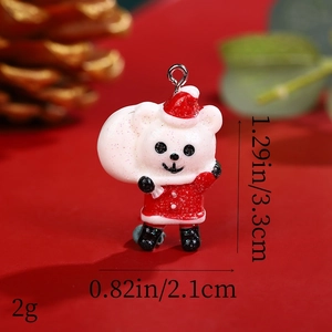 Close-up of resin Christmas bear pendant with dimensions 3.3x2.1cm and 2g weight