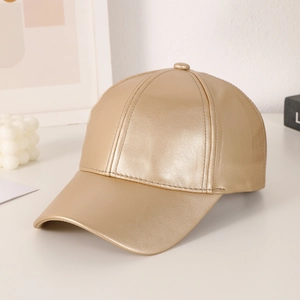 Minimalist faux leather baseball cap in metallic gold with detailed stitching