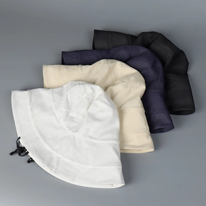 Detail showing adjustable drawstring on wide brim sun hats in four classic colors