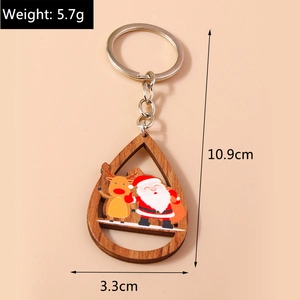 Détails des dimensions d'un porte-clés de Noël en bois avec anneau métallique