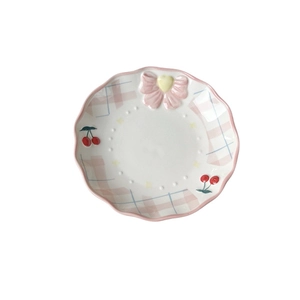 Pink checkered ceramic plate with cherry patterns and a decorative pink 3D bow