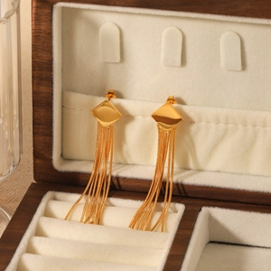Boucles d'oreilles en acier inoxydable doré avec longues chaînes serpent suspendues