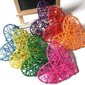 Close-up of assorted colorful heart-shaped wicker ornaments for wall decoration