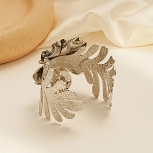 Artistic silver floral leaf open cuff bracelet with textured metallic finish for women