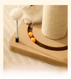 Detail of cat scratching post with wide wooden base, sisal rope, and orange track ball