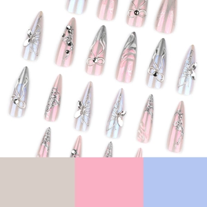 Long stiletto press-on nails with 3D silver butterfly and pearlescent mirror finish.