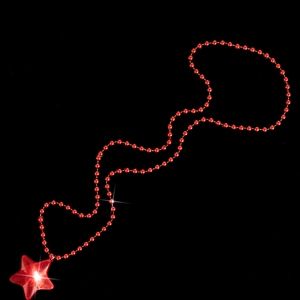 Detail of red beaded festive necklace featuring a star pendant on a dark background