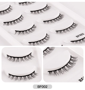 Macro shot of BF002 natural fiber false eyelashes showing curl and root detail