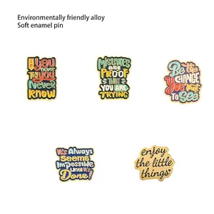 Set of vintage metal quote enamel pins with size charts on a white background
