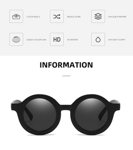 Detail view of round black matte kids sunglasses with UV protection features
