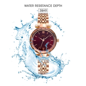 Waterproof women's watch with rose gold strap and faceted crystal ruby red dial