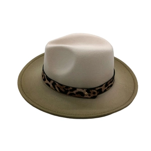 Detail view of fedora hat with beige crown, khaki brim and leopard print band buckle