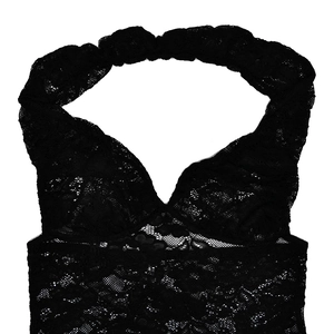 Close-up of black lace halter neck bodysuit featuring intricate floral embroidery