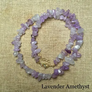 Macro view of lavender amethyst crystal necklace with golden adjustable lobster clasp