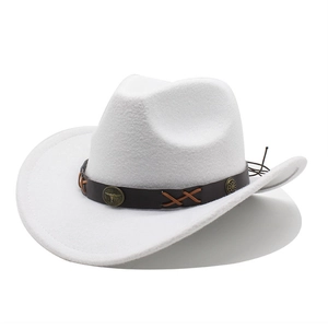 White western cowboy hat with a brown leather band and a vintage metal bull head emblem